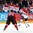 PRAGUE, CZECH REPUBLIC - MAY 2: Austria's Thomas Hundertpfund #27 looks to make a play while Switzerland's Simon Bodenmann #23 defends during preliminary round action at the 2015 IIHF Ice Hockey World Championship. (Photo by Andre Ringuette/HHOF-IIHF Images)

